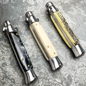 Couteau stiletto à cran d'arrêt lame kris